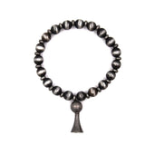 BR190325-13     Silver Navajo bead bracelet with squash blossom charm