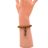 BR190522-08COP   Brown 8 mm real stone bracelet with copper squash blossom charm