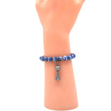 BR190522-07SLV     Navy blue with white 8mm real stone bracelet with silver squash blossom charm