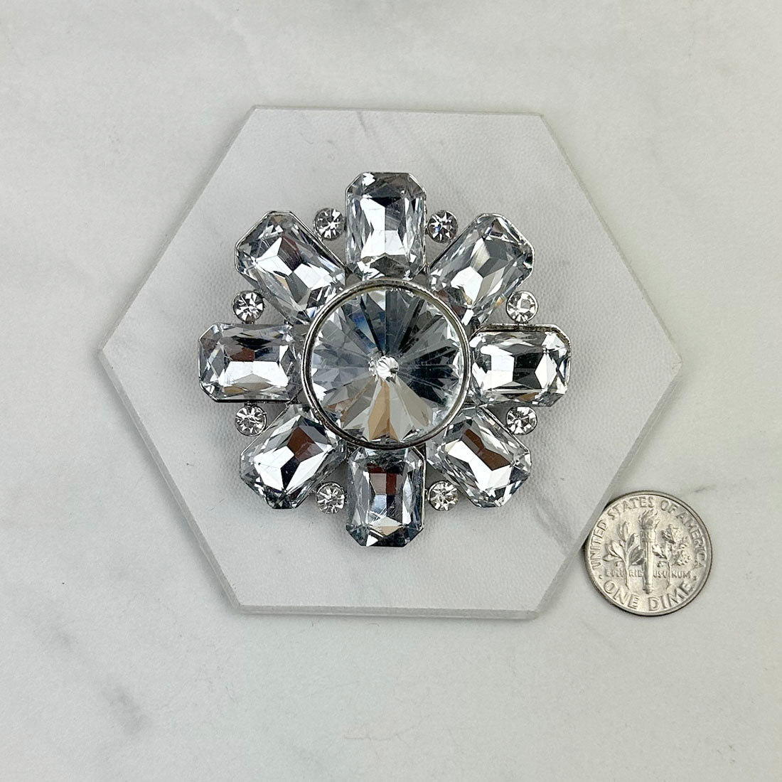 BC111026-09      Silver with clear crystal brooch