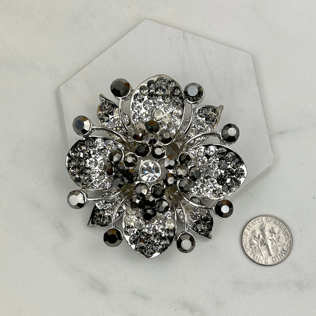 BC120506-01-BLACK         Silver with black and clear crystal brooch