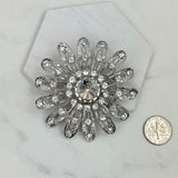 BC120510-13     Silver with clear crystal brooch