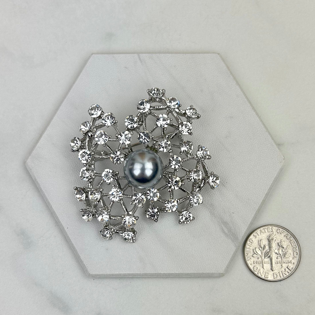 BCH230925-06      Silver with clear crystal brooch