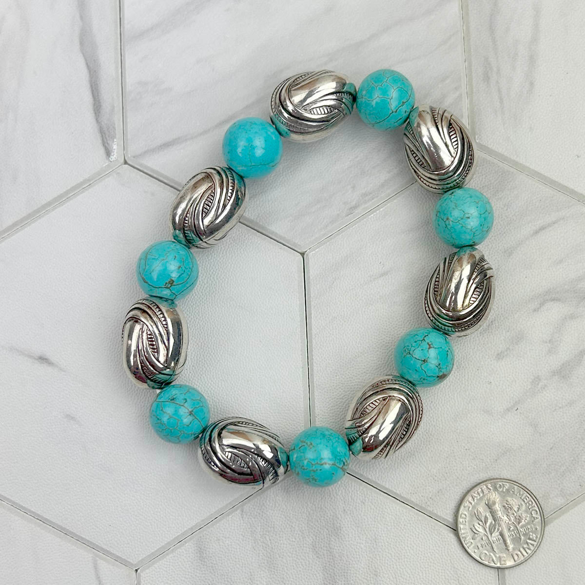 BR231216-08        Blue turquoise stone beads with silver color nuggets Bracelet
