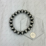 BR250120-22               12 mm stretch silver Navajo pearl beads Bracelet