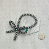 BR250221-03              Silver Navajo pearl with green turquoise stone beads bow tie Bracelet
