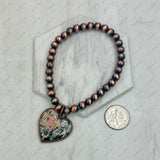 BR250308-11                Copper Navajo pearl beads with western heart strength Bracelet