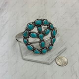 BR250930-01-BLUE                 Silver metal with blue turquoise stone peace sign Bangle