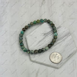BR251126-09                  6mm dark green jasper stone stretch Bracelet