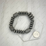 BR251205-01               Silver Navajo pearl roundel and barrel beads stretchy Bracelet
