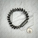 BR251219-01                Silver Navajo pearl roundel and barrel beads stretchy Bracelet