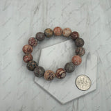 BR251228-14                      12 mm brown round jasper beads stretch Bracelet