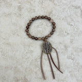 BRS230528-05    Brown jasper Bracelet with tassel and cactus pendent
