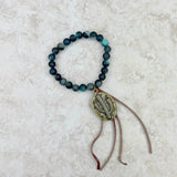 BRS230528-06    "Dark blue jasper Bracelet with tassel and  metal cactus pendent"
