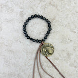 BRS230528-08    Black jasper Bracelet with tassel and horse pendent