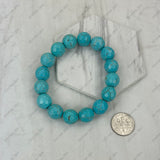 BRZ230905-01                     Blue face cut turquoise stone beads stretch Bracelet