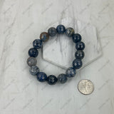 BRZ230905-01                     Blue face cut turquoise stone beads stretch Bracelet