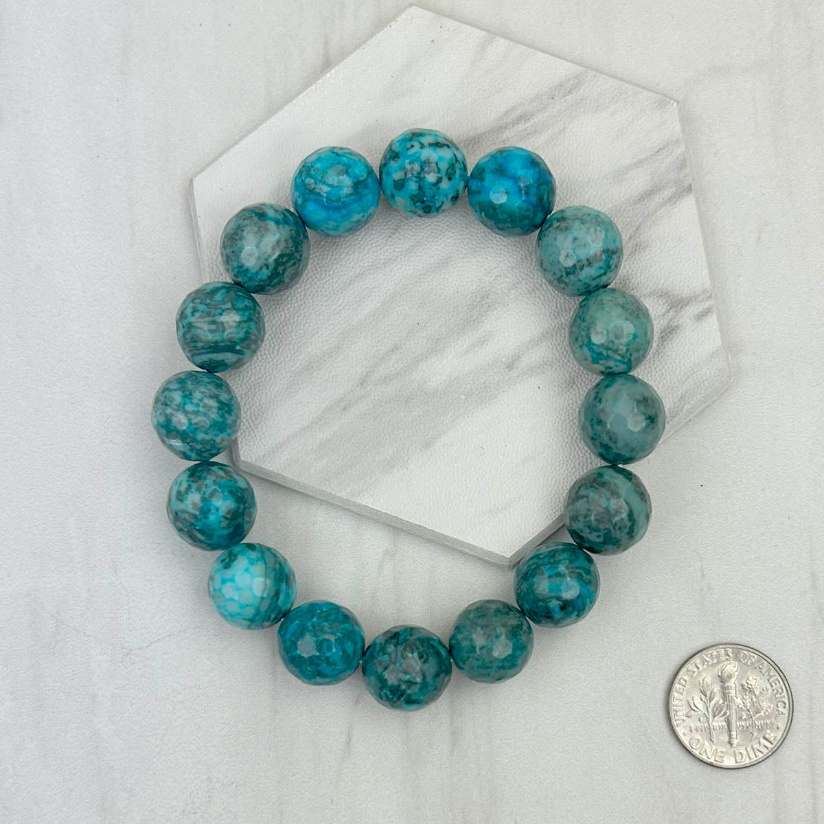 BRZ230905-06                       Blue face cut agate beads Bracelet.