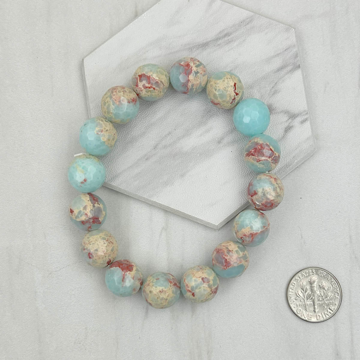 BRZ230905-11                  Light blue face cut agate beads Bracelet.