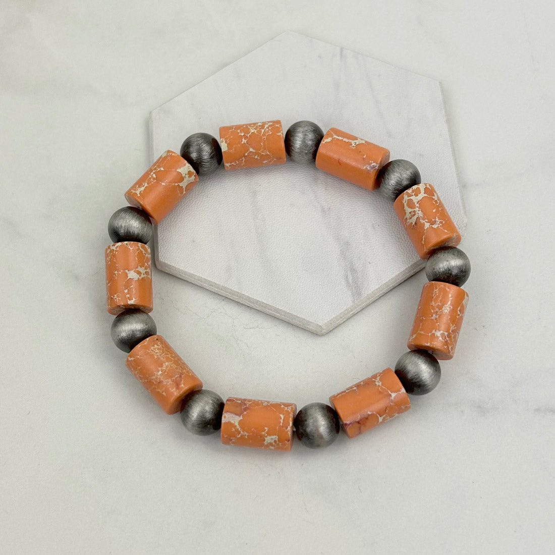 BRZ230930-03      Orange stone with silver Navajo pearl beads bracelet