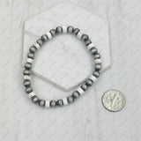 BRZ240708-33            Light pink roundel stone and silver Navajo pearl beads bracelet