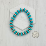 BRZ240708-43                                          Blue flat roundel turquoise stone and copper Navajo pearl beads bracelet