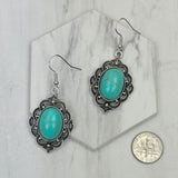 ER240125-03-BLUE                        silver with blue  turquoise oval stone Earrings.