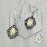 ER240125-03-BLUE                        silver with blue  turquoise oval stone Earrings.