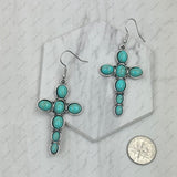 ER240125-04-BLUE                       silver with blue  turquoise oval stone cross Earrings.