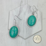 ER240125-01-BLUE                     silver with blue  turquoise oval stone Earrings.