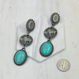 ERZ231205-21                   Silver metal flower and buffalo concho with blue turquoise oval stone Earrings