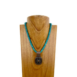NKS230708-12	"17 Inches long dark blue roundel turquoise stone with copper  concho pendant Necklace"
