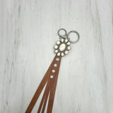 NKY250121-60          Silver metal and white stone with brown leather Key chain