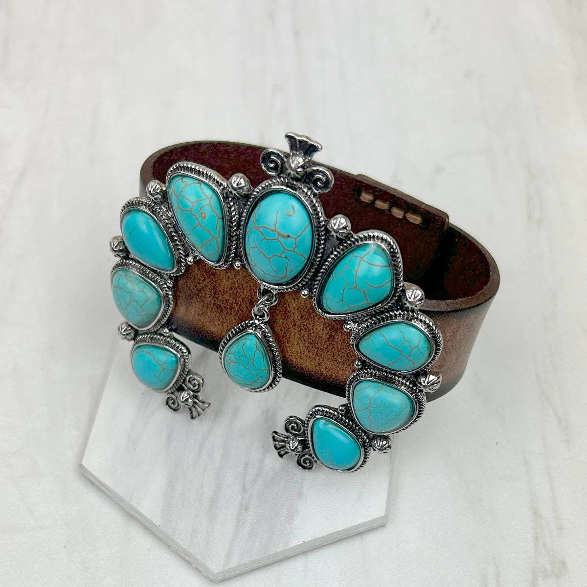 NKZ231226-08                 Brown leather with large blue turquoise blossom squash bracelet