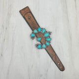 NKZ231226-08                 Brown leather with large blue turquoise blossom squash bracelet