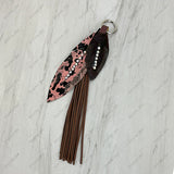 PC260406-01              Western Leather feather with brown tassel Purse charm