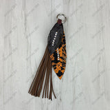 PC260406-05         Western Leather feather with brown tassel Purse charm