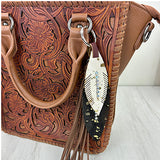 PC260406-12                    Western Leather feather with brown tassel Purse charm
