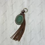 PC260406-20                   Western Leather feather with brown tassel Purse charm