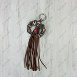 PC260406-22                  Western Leather feather with brown tassel Purse charm