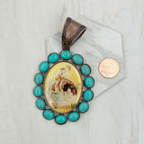 PD231210CP-13               Copper metal with blue turquoise stone oval cowboy Pendent