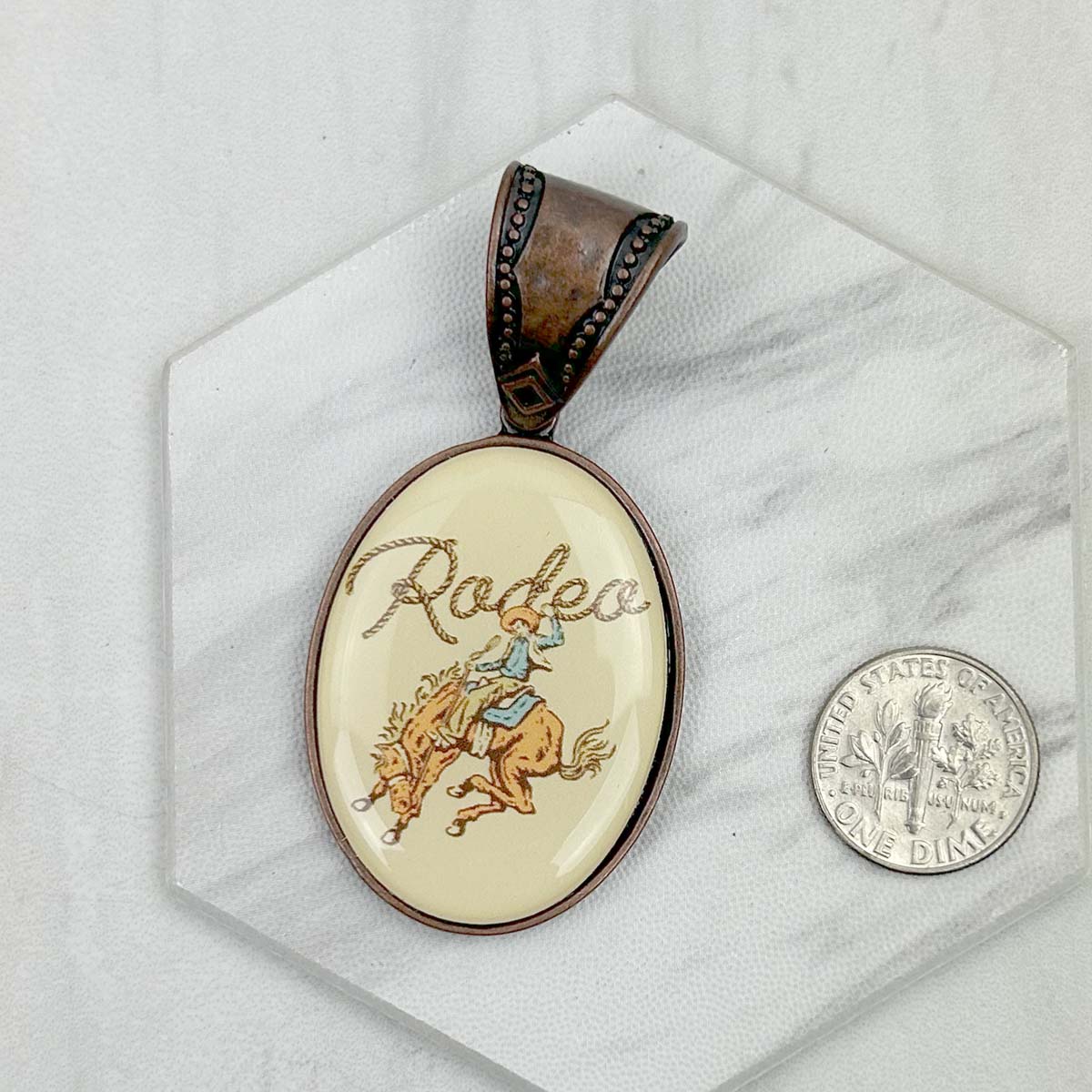PD231210CP-75                                Copper metal oval cowboy pendent