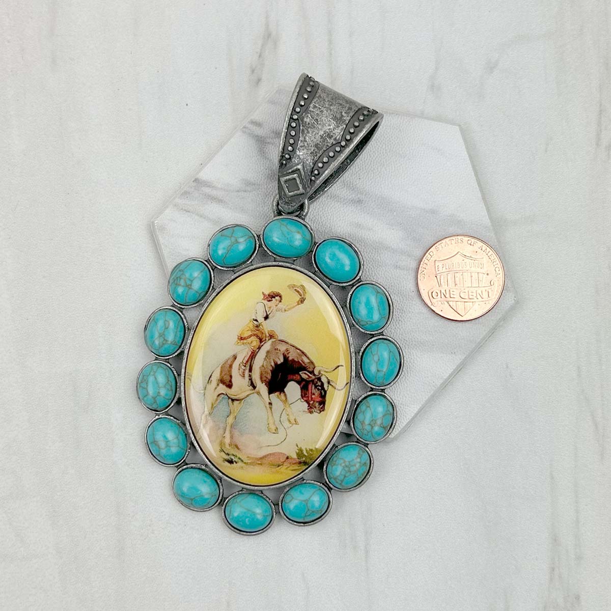 PD231210SL-09                 silver metal with blue turquoise stone oval cowboy Pendent