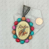 PD231210SL-09                 silver metal with blue turquoise stone oval cowboy Pendent