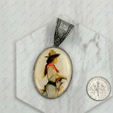 PD231210SL-71                                silver metal oval cowboy pendent