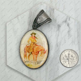 PD231210SL-71                                silver metal oval cowboy pendent