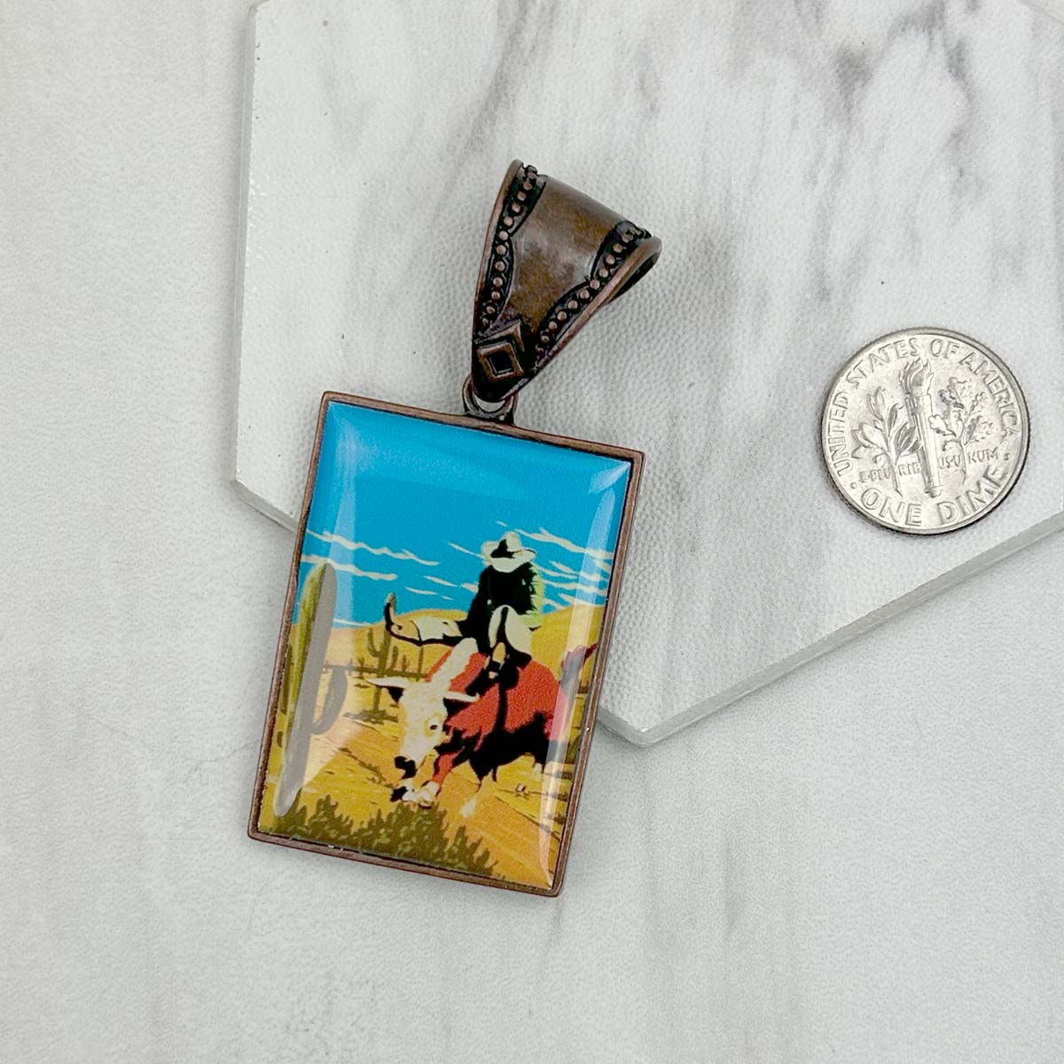PD231210CP-85                              Copper metal triangle cowboy pendent