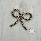 PD250208-01           4mm copper Navajo pearl beads bow tie pendent
