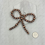 PD250208-02           6mm copper Navajo pearl beads bow tie pendent (Copy)