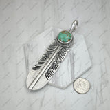 PD251130-01-BLUE                 Silver metal with blue turquoise stone feather Pendent